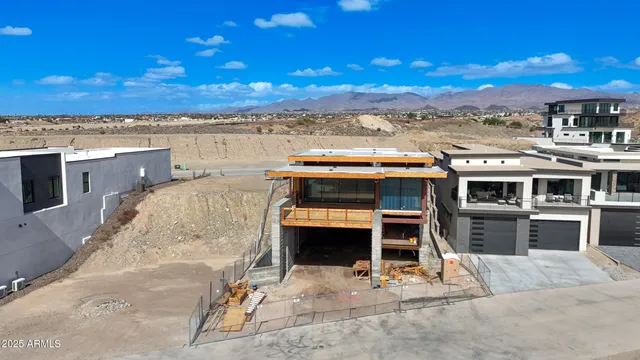 a view of a balcony with wooden floor and city view