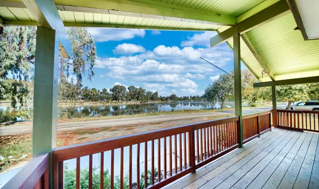 a view of an empty room with a fireplace