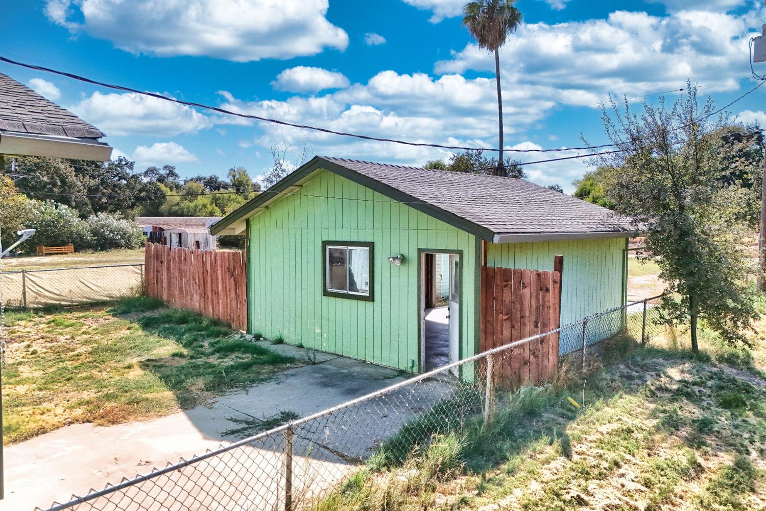 30000 Kasson Road Tracy, CA 95304 - Photo 18 of 71 a front view of a house with garden