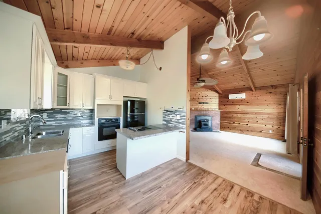 a view of an empty room with a garage