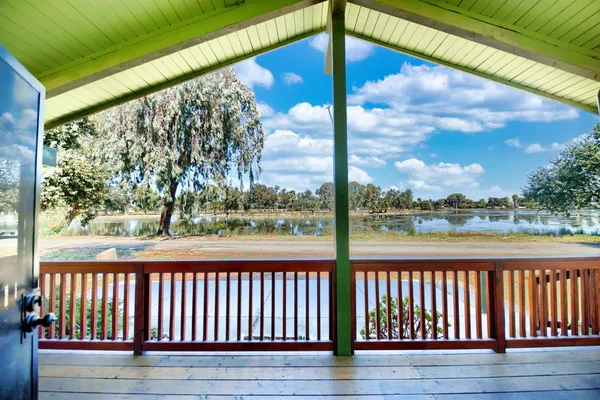 a view of a kitchen with furniture and a fireplace