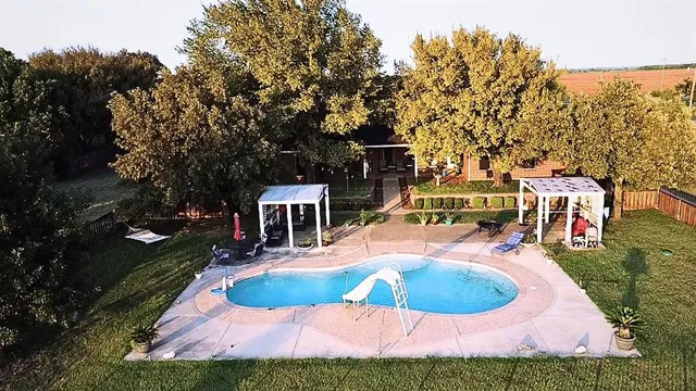a view of lake with green space