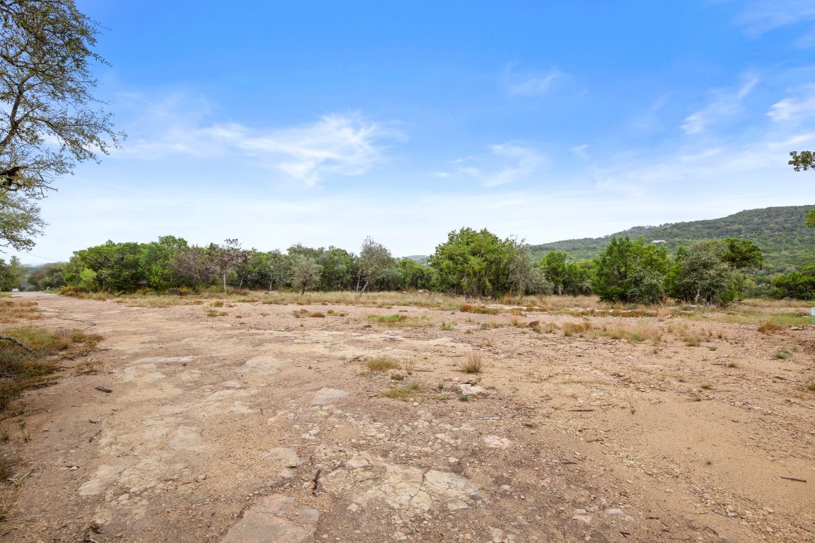 18211 Gregg Bluff Road Jonestown, TX 78645 - Photo 6 of 24 View of local wilderness with rural landscape and mountains