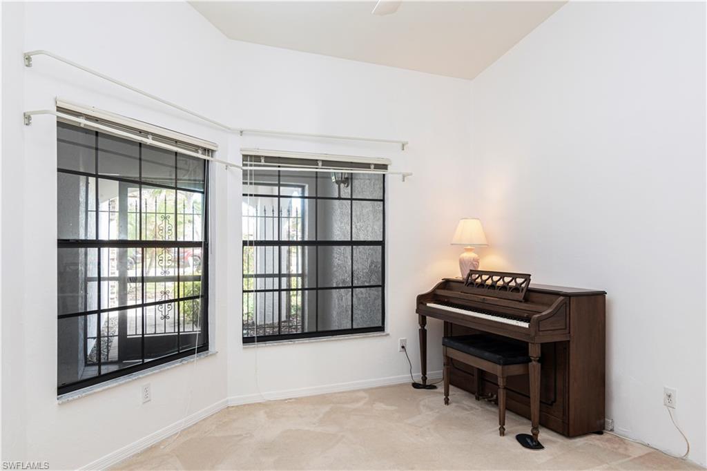 249 St James Way Naples, FL 34104 - Photo 14 of 23 a view of a workspace with furniture