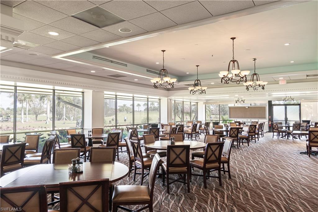 249 St James Way Naples, FL 34104 - Photo 21 of 23 a view of a dining room with furniture window and outside view