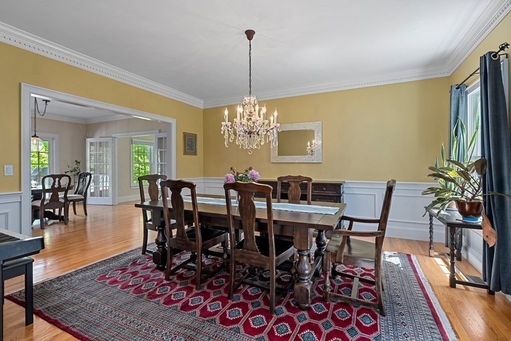 30 Pinecroft Road Weston, MA 02493 - Photo 15 of 38 a view of a dining room with furniture window and wooden floor