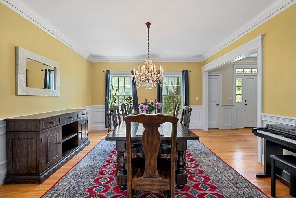 30 Pinecroft Road Weston, MA 02493 - Photo 16 of 38 a view of a dining room with furniture window and wooden floor