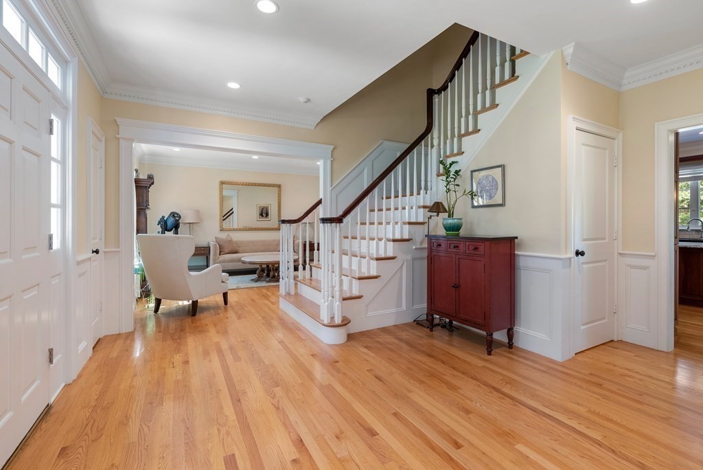30 Pinecroft Road Weston, MA 02493 - Photo 17 of 38 a view of entryway with wooden floor and stairs