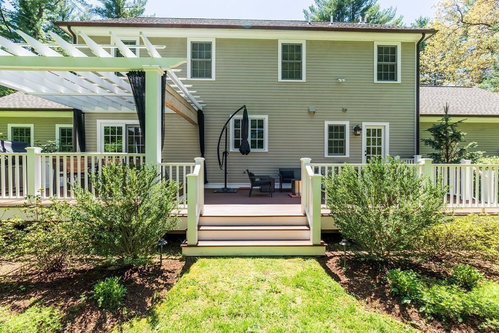 30 Pinecroft Road Weston, MA 02493 - Photo 38 of 38 a front view of a house with a yard
