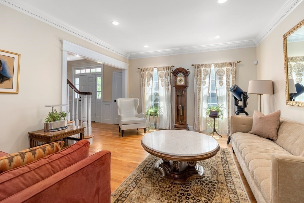 30 Pinecroft Road Weston, MA 02493 - Photo 7 of 38 a living room with furniture and a wooden floor