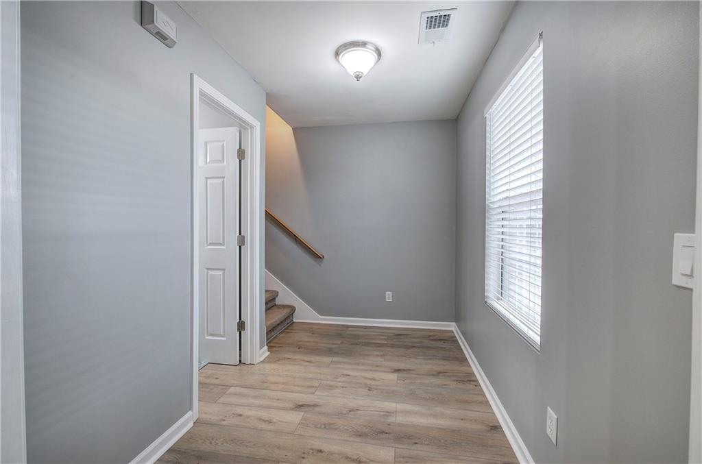91 Westside Chase Southwest Cartersville, GA 30120 - Photo 15 of 32 a view of an entryway with wooden floor