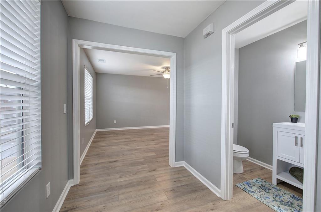 91 Westside Chase Southwest Cartersville, GA 30120 - Photo 17 of 32 a view of room with hardwood floor and a ceiling fan