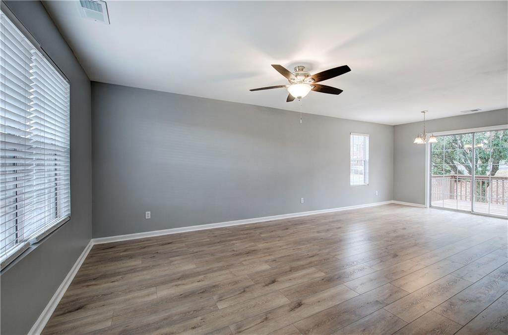 91 Westside Chase Southwest Cartersville, GA 30120 - Photo 19 of 32 wooden floor in an empty room with a window