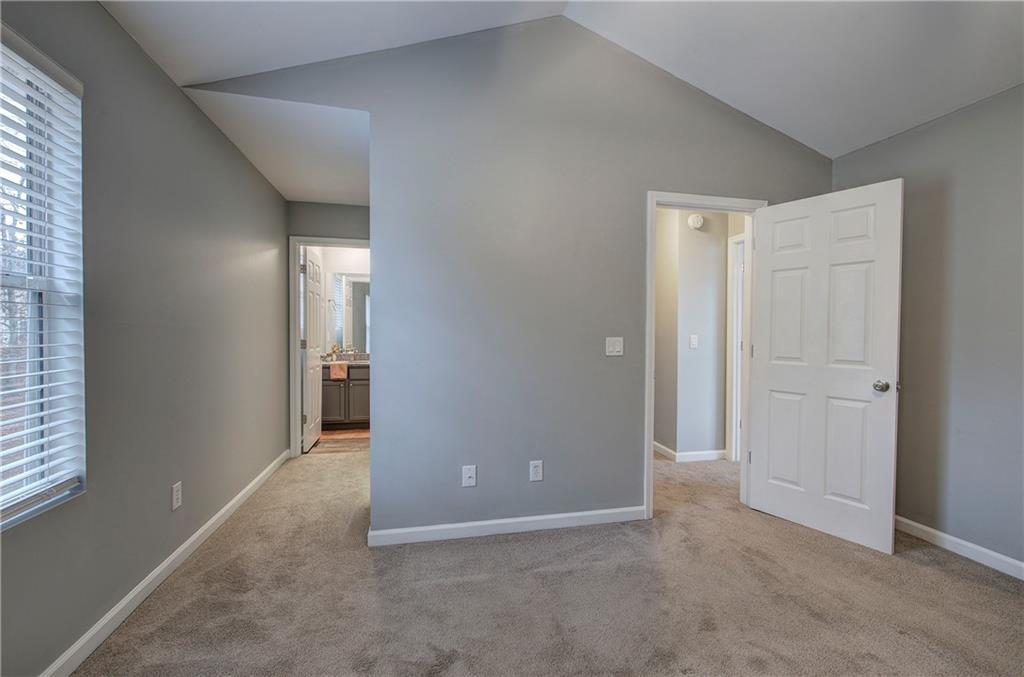 91 Westside Chase Southwest Cartersville, GA 30120 - Photo 25 of 32 an empty room with windows and closet