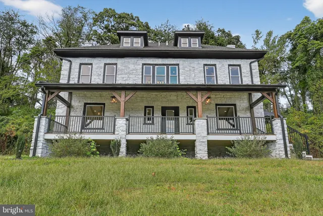 front view of a house with a small yard