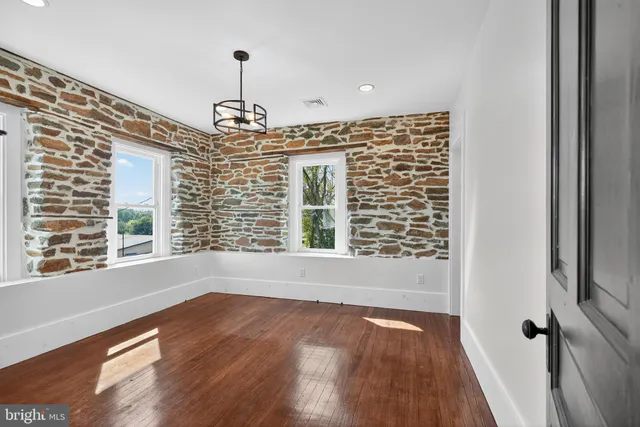 a view of livingroom with hardwood floor and window