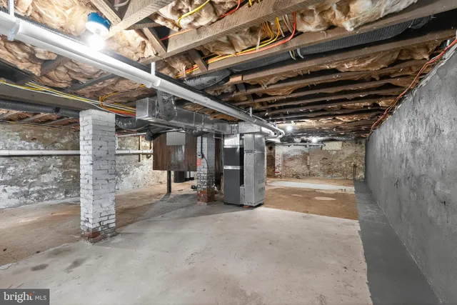 a view of a room with wooden walls