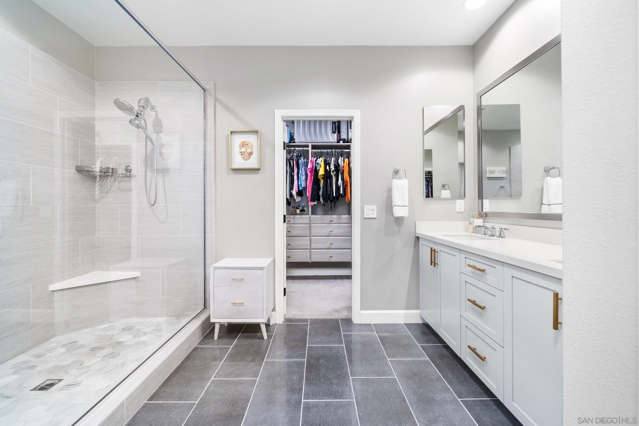 103 Lavender Lake Forest, CA 92630 - Photo 17 of 52 a bathroom with a sink a toilet and shower