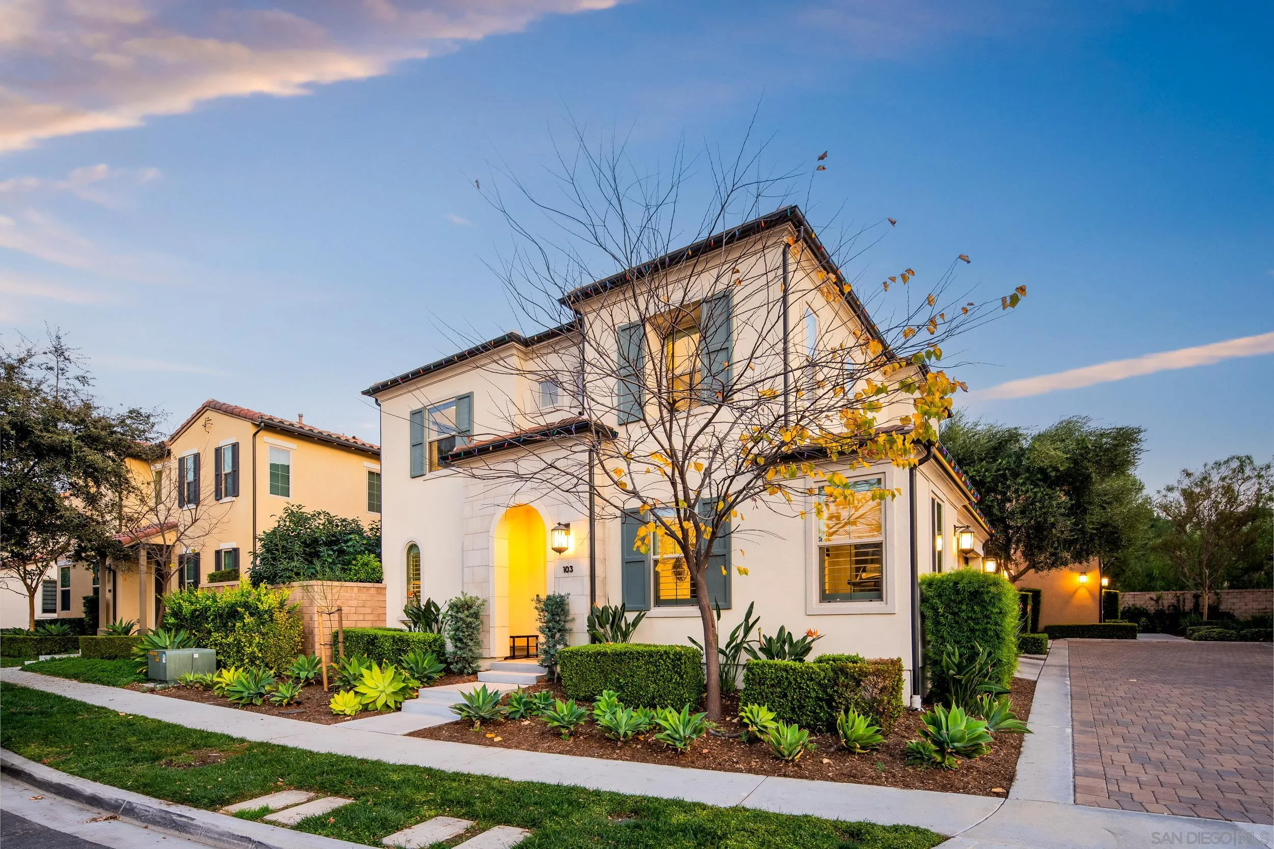 103 Lavender Lake Forest, CA 92630 - Photo 2 of 52 a front view of house with small garden