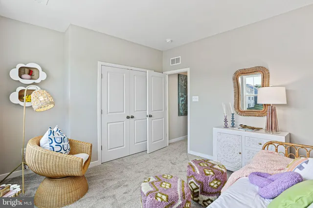 a living room with furniture and window