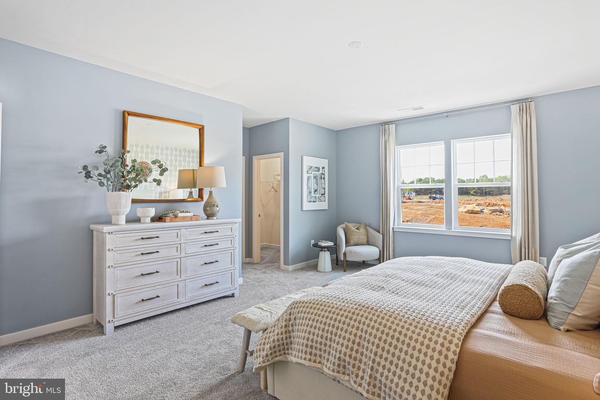 Shenandoah Springs Shenandoah Springs, Unit BRIARS Ranson, WV 25438 - Photo 17 of 23 a bedroom with a bed and a window
