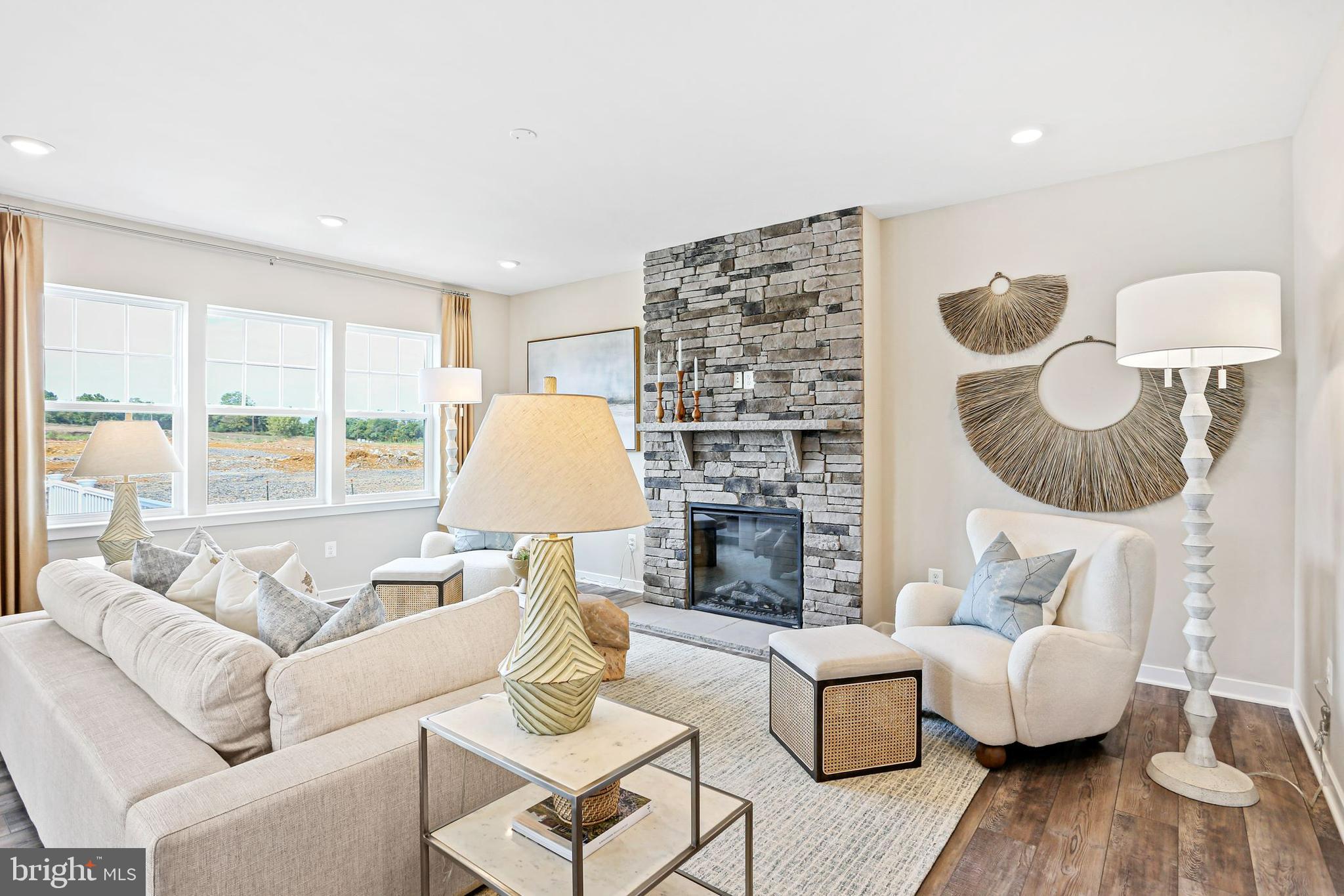 Shenandoah Springs Shenandoah Springs, Unit BRIARS Ranson, WV 25438 - Photo 4 of 23 a living room with furniture and a fireplace