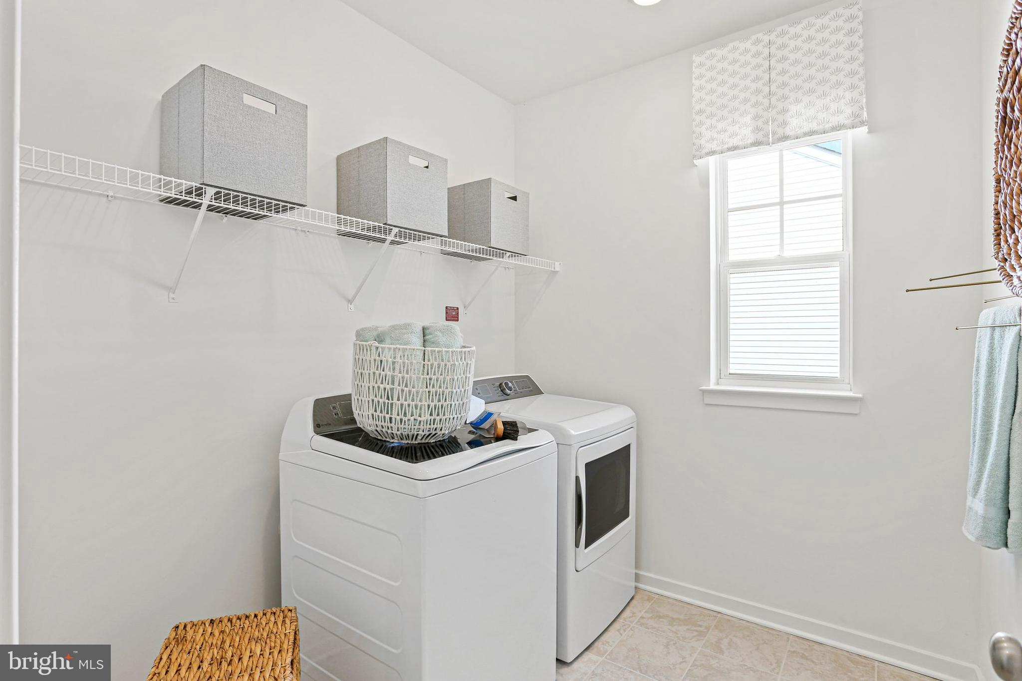 Shenandoah Springs Shenandoah Springs, Unit BRIARS Ranson, WV 25438 - Photo 9 of 23 a room with storage and utility