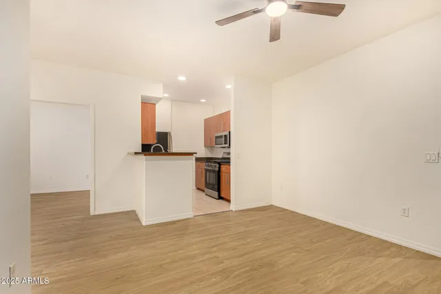 a view of kitchen with wooden floor