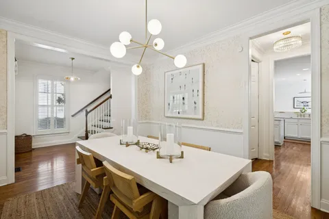 a living room with furniture fireplace and window
