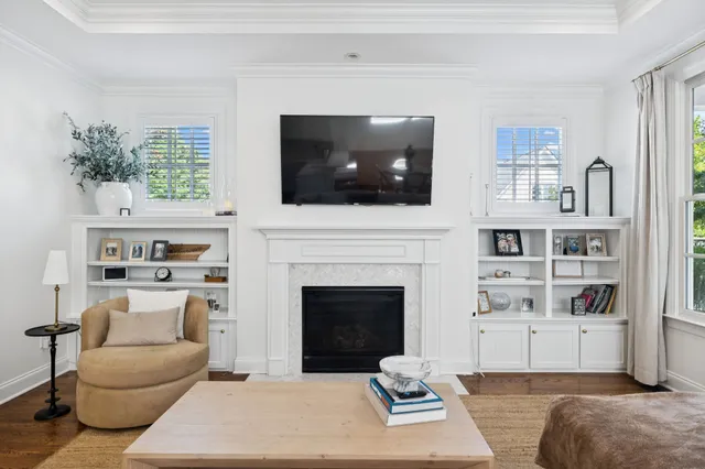 a kitchen with a sink a stove and cabinets