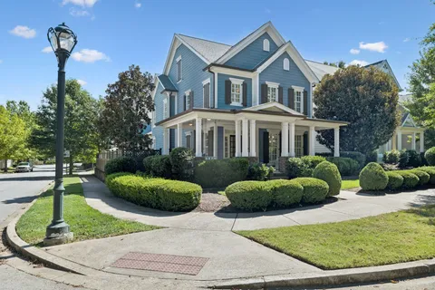 a front view of a house with a porch