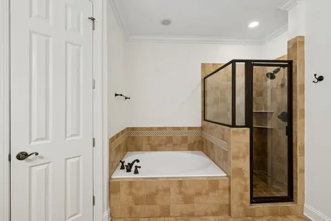 a bathroom with a sink vanity mirror and toilet