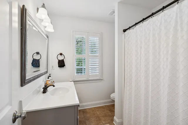 an aerial view of a house with swimming pool