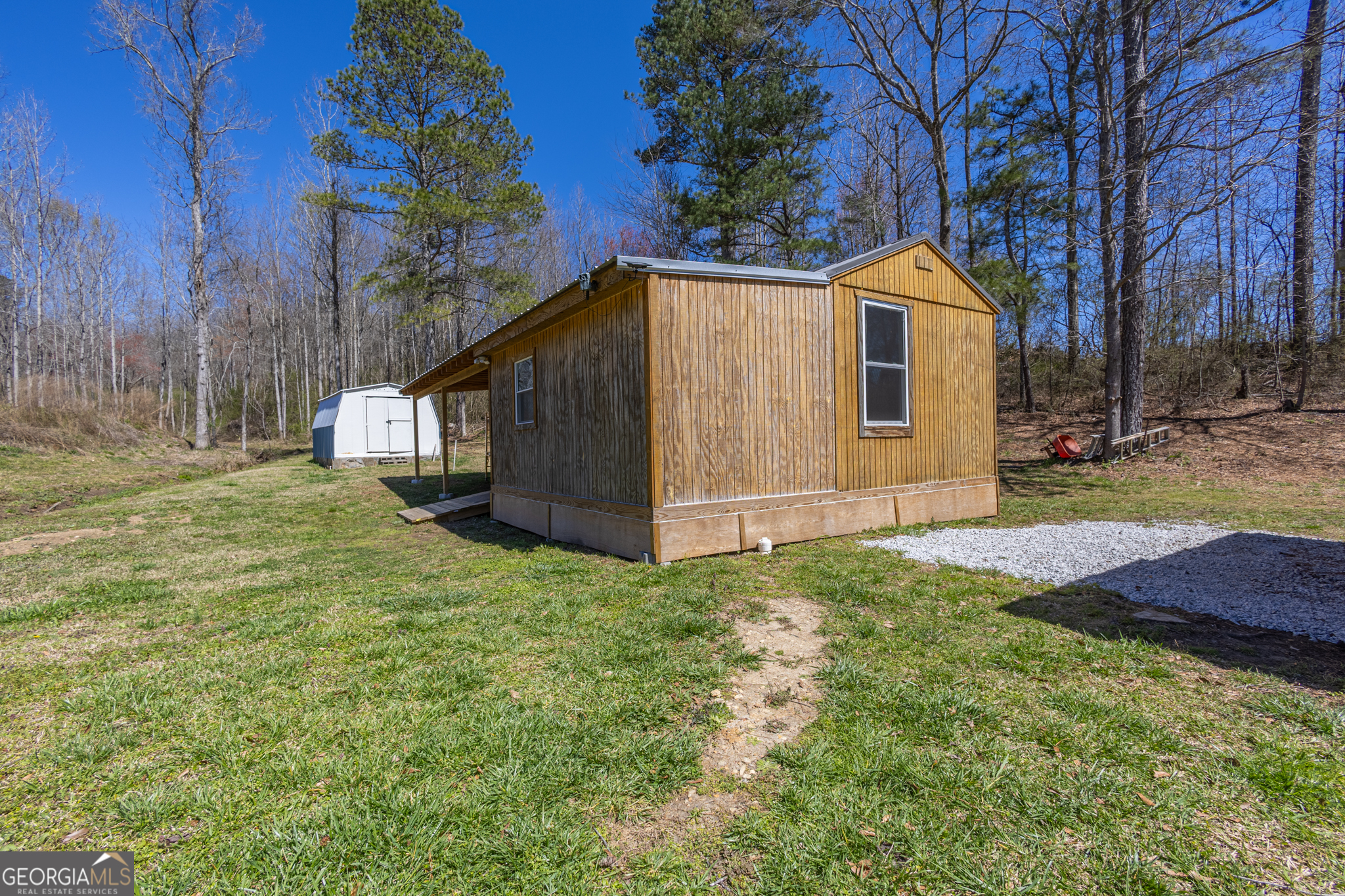 727 County Road 677 Ranburne, AL 36273 - Photo 15 of 24 a view of backyard of house