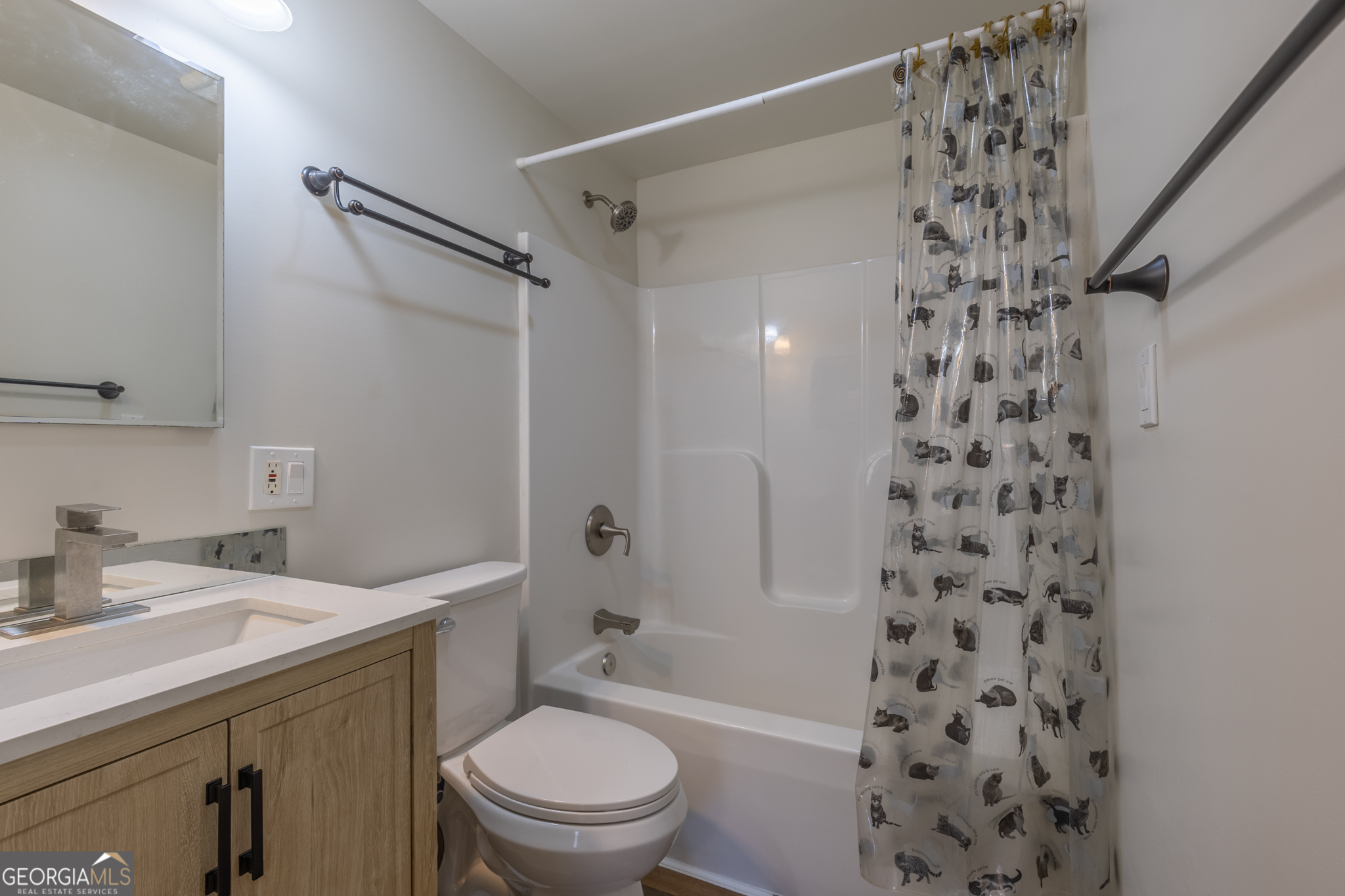 727 County Road 677 Ranburne, AL 36273 - Photo 3 of 24 a bathroom with a sink toilet a shower and a mirror