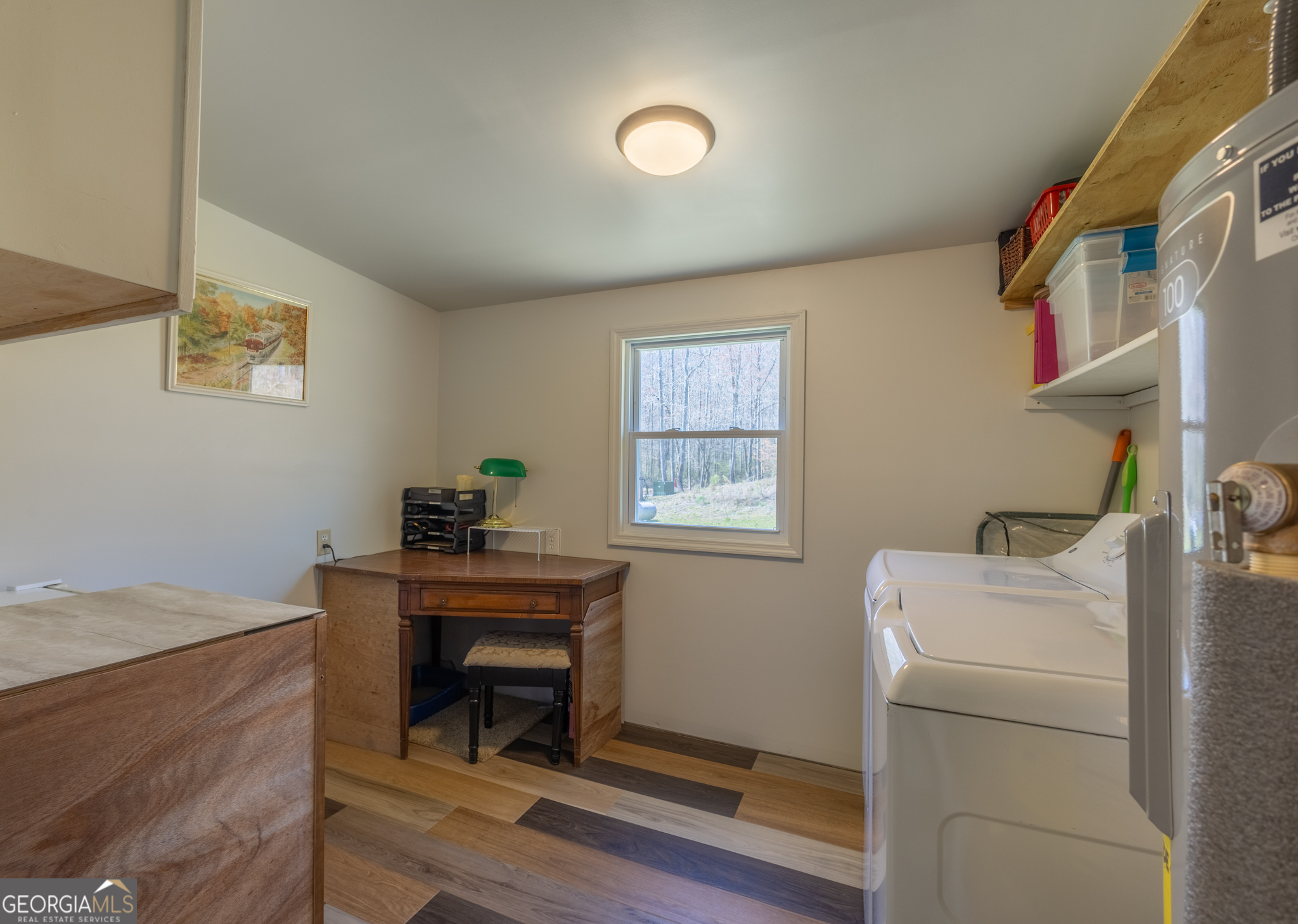 727 County Road 677 Ranburne, AL 36273 - Photo 4 of 24 a room with a table and a window