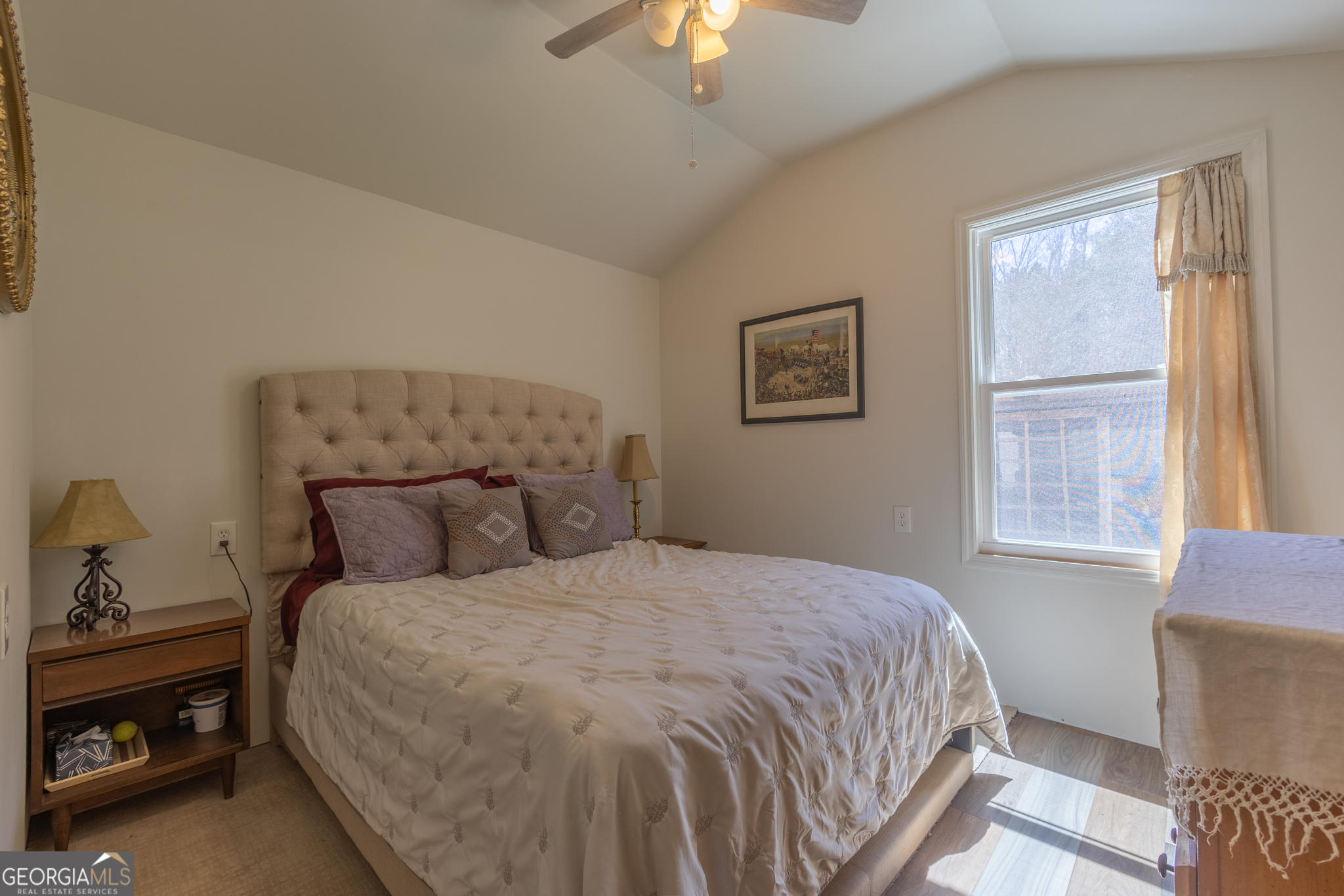 727 County Road 677 Ranburne, AL 36273 - Photo 5 of 24 a bedroom with a bed and a chandelier