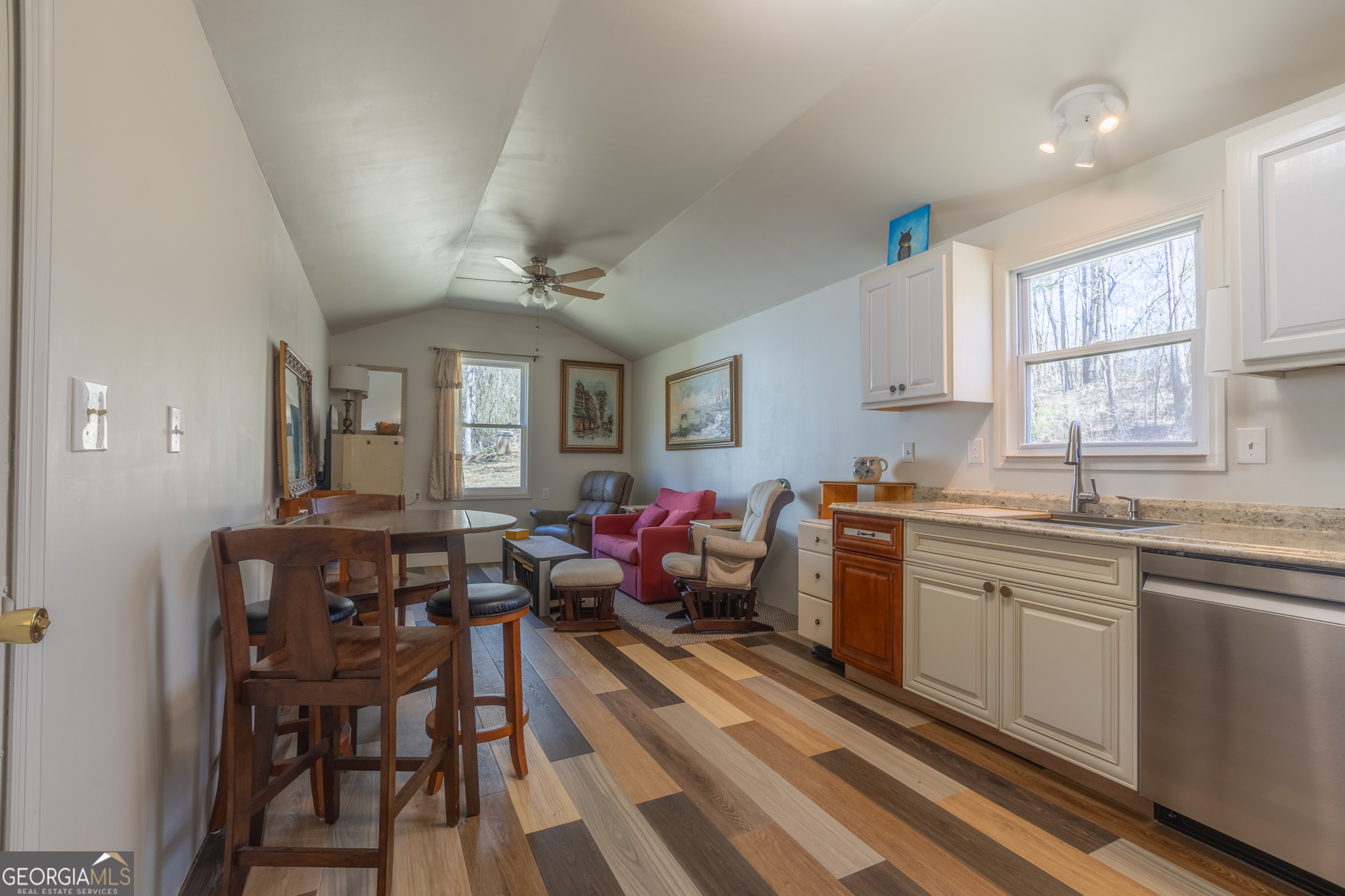 727 County Road 677 Ranburne, AL 36273 - Photo 6 of 24 a living room with stainless steel appliances kitchen island granite countertop furniture and a kitchen view