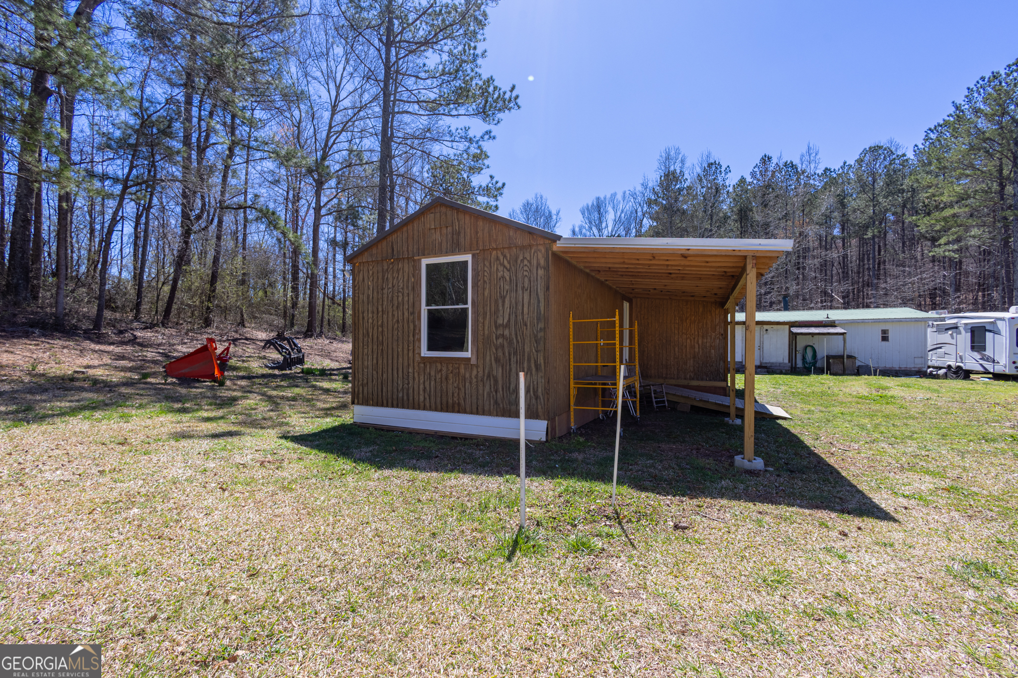727 County Road 677 Ranburne, AL 36273 - Photo 9 of 24 a view of a backyard with a barn