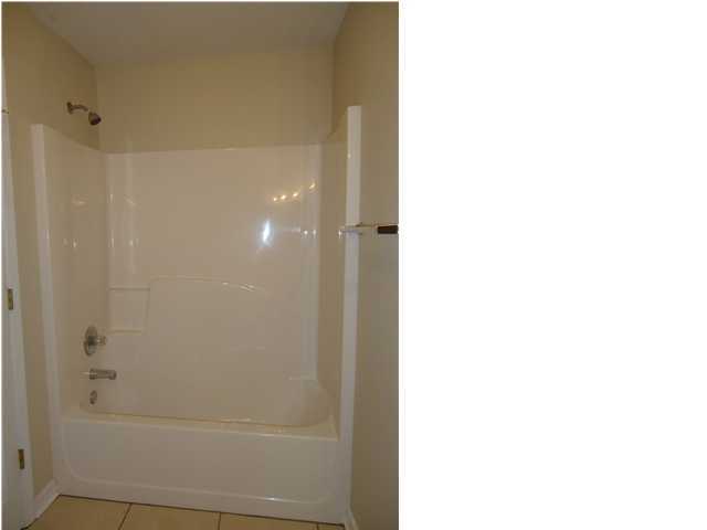 2877 Aplin Road Crestview, FL 32539 - Photo 12 of 17 a bathroom with a shower