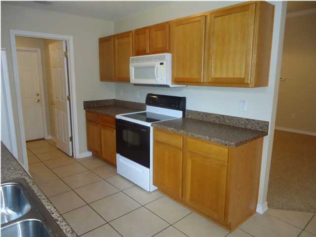 2877 Aplin Road Crestview, FL 32539 - Photo 3 of 17 a utility room with dryer and washer