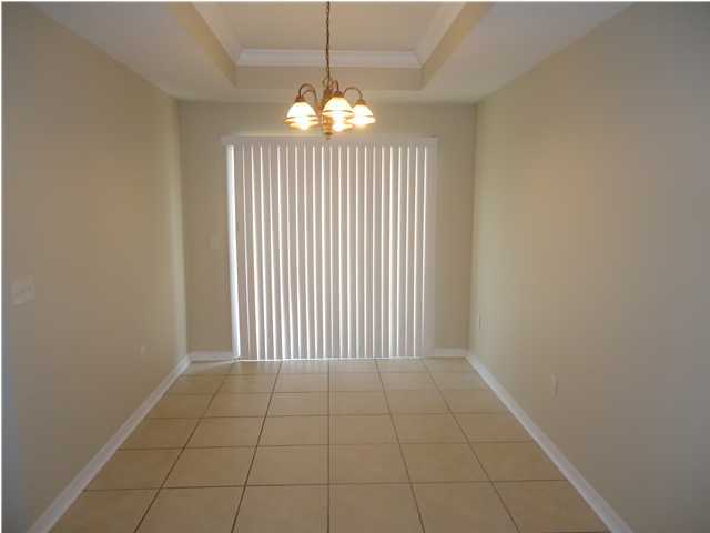 2877 Aplin Road Crestview, FL 32539 - Photo 5 of 17 a view of an empty room with a window