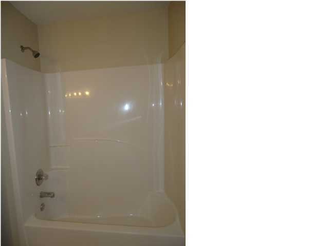 2877 Aplin Road Crestview, FL 32539 - Photo 8 of 17 a bathroom with a bathtub