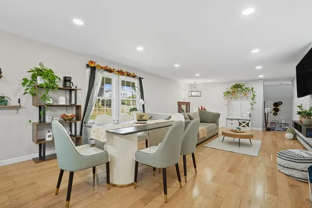 a living room with furniture and a table