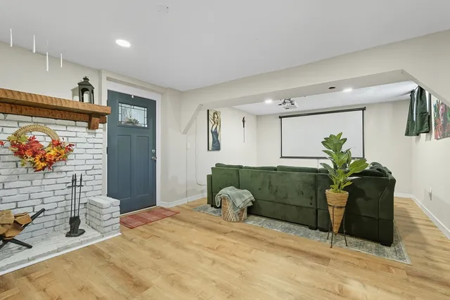 a bedroom with a bed and ceiling fan