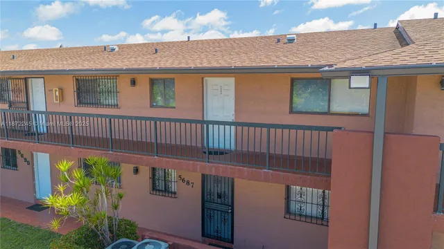 a view of a deck with wooden floor