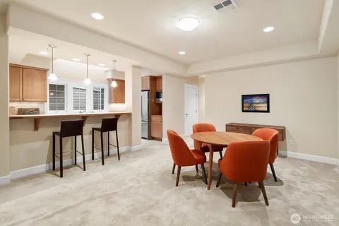 a view of a dining room with furniture