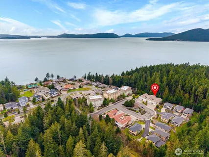 a aerial view of a house with lake view