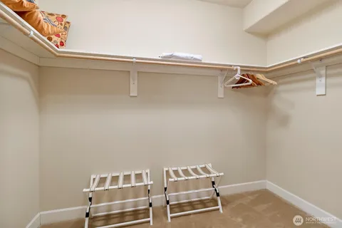 a view of room with racks on the wall