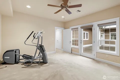 a view of a room with gym equipment